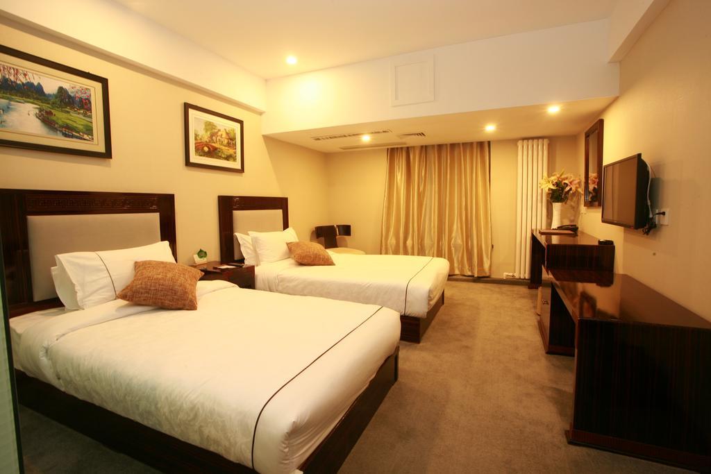 Harbin Yakelai Holiday Hotel Phòng bức ảnh