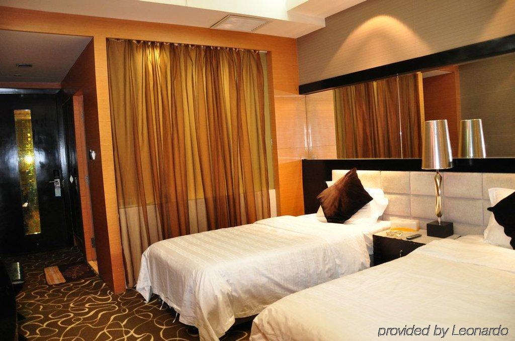 Harbin Yakelai Holiday Hotel Phòng bức ảnh