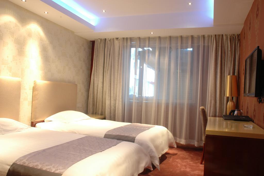 Harbin Yakelai Holiday Hotel Phòng bức ảnh