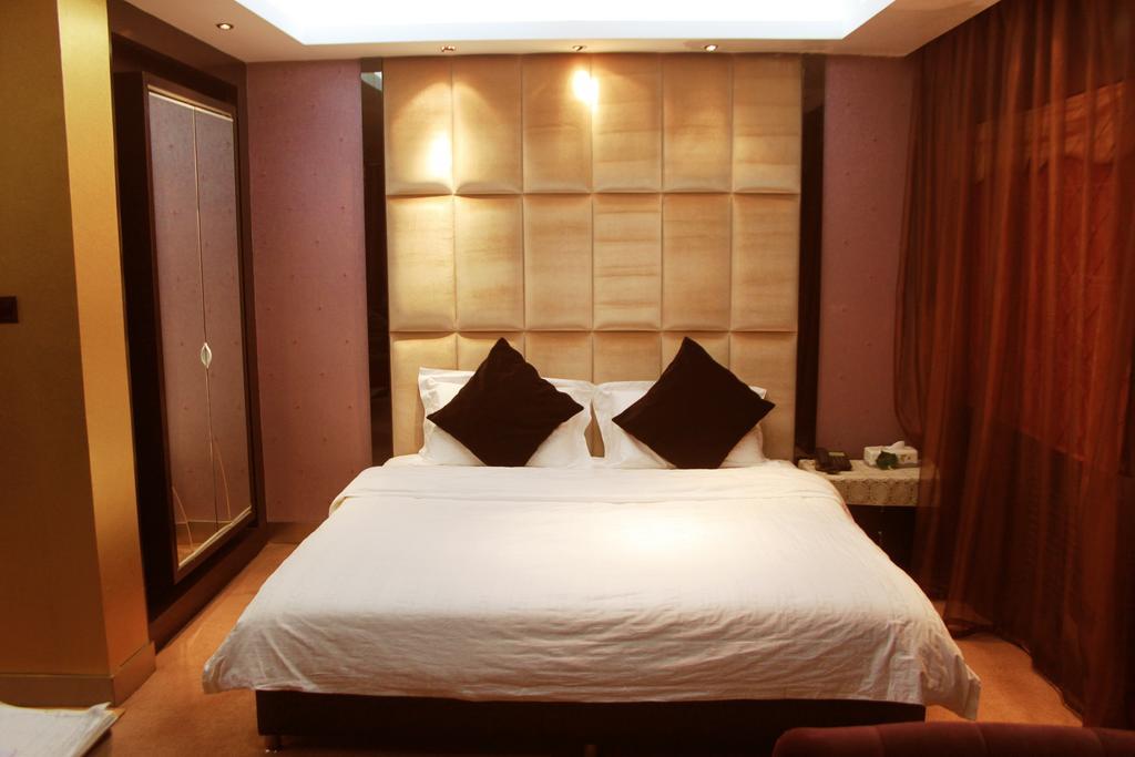 Harbin Yakelai Holiday Hotel Phòng bức ảnh