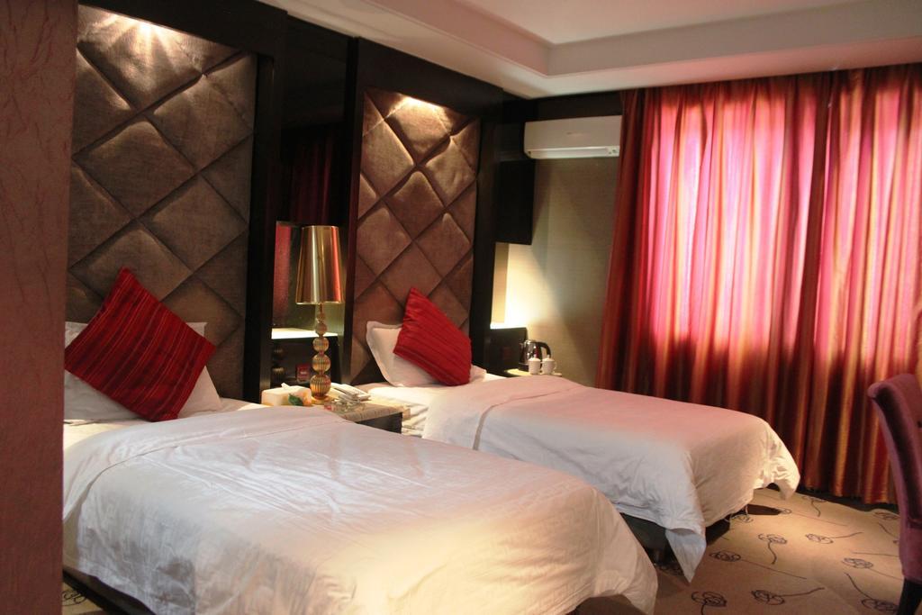 Harbin Yakelai Holiday Hotel Phòng bức ảnh