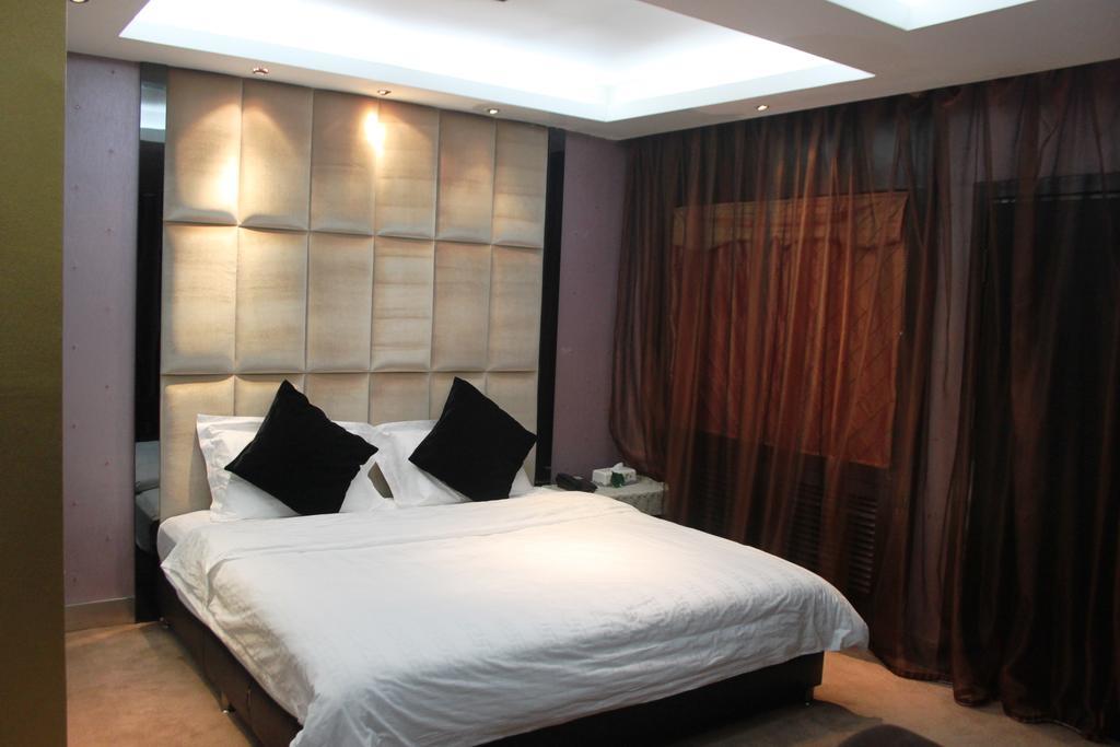 Harbin Yakelai Holiday Hotel Phòng bức ảnh